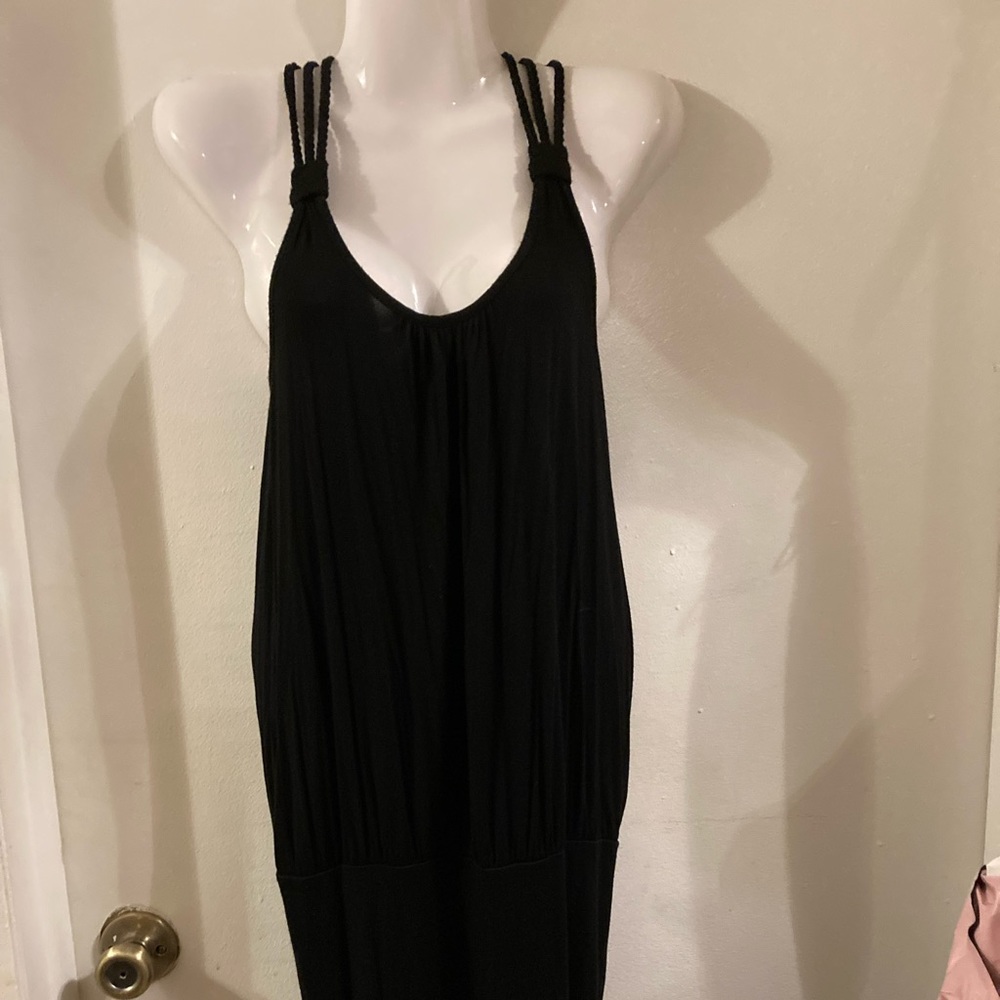 Body shaping sensual black dress that can be made shorter or longer.